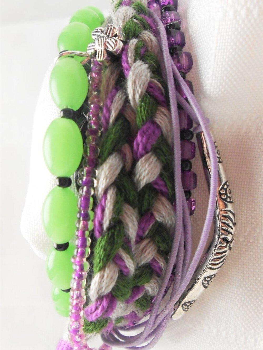 Handmade bracelet with rows of threads, beads, and charms No. 220